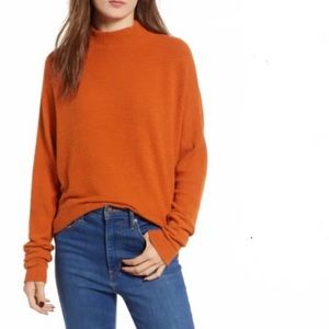 Very soft orange sweater, purchased at Nordstrom